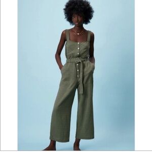 PLT grey/black cargo like pants with a paint splatter design